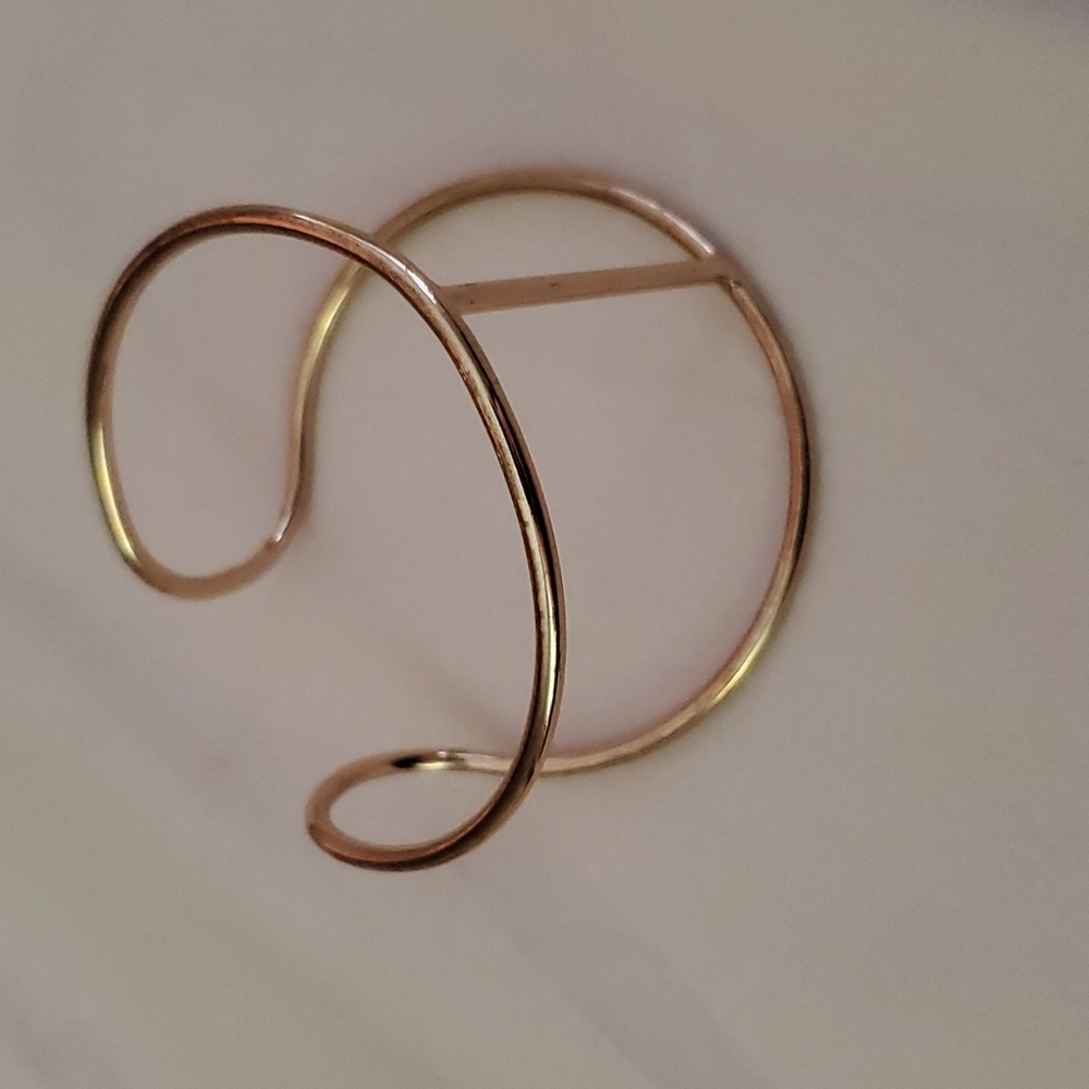 Gold cuff bracelet